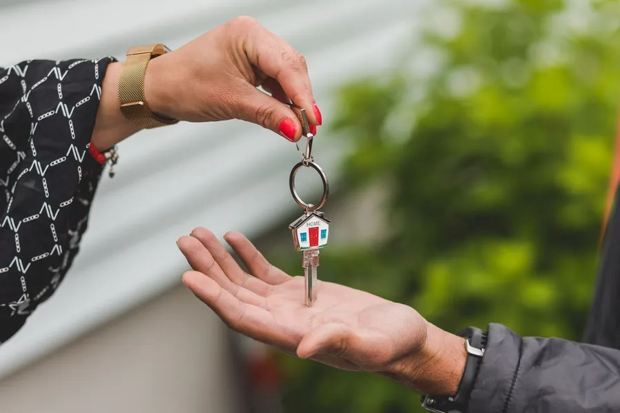 House keys being handed over on completion day