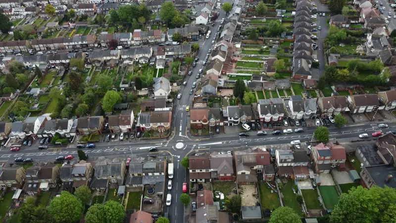 Aerial view of long rows of terraced streets of the kind where rear dormer loft conversions are common