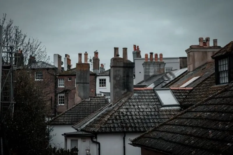 Croydon rooftops and chimney stacks under a bright summer sky